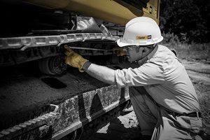 Carter employee working on equipment