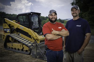 Carter employees with machines