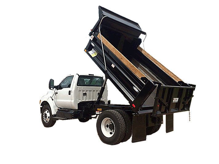 dump truck with bed lifted on white background