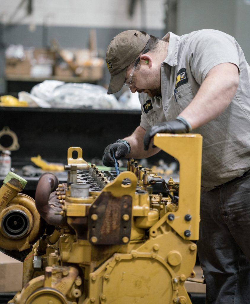 Man working on generators