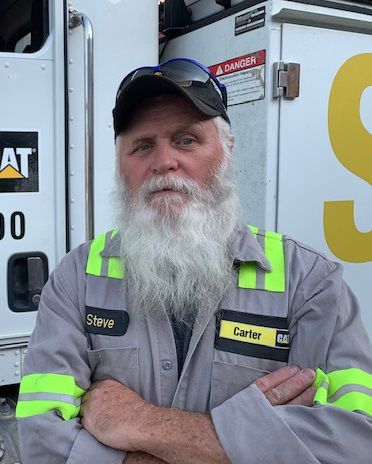 Steve standing in front of his truck