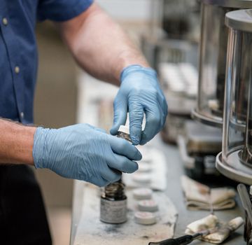 A Carter Cat employee completing a fluid analysis