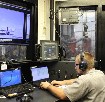 A Carter Cat employee performing dyno testing