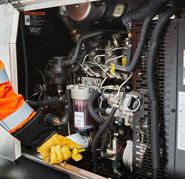 A Carter Technician testing an industrial level engine