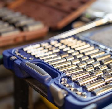 A variety of tools in a blue case