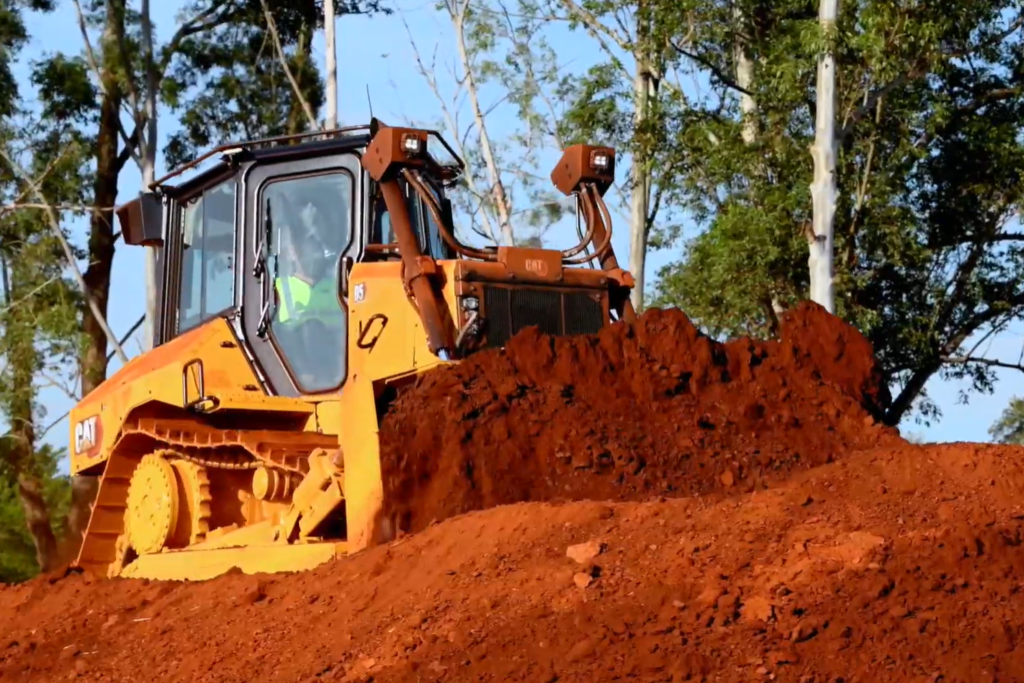 Cat dozer at work moving dirt