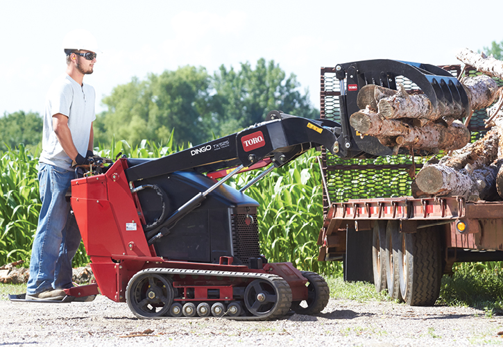 Toro Dingo with Operator Loading Logs